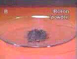 Boron powder on 700°C surface in air.     Click for unexciting video.