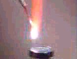 Magnesium strip igniting in gas flame.     Click for exciting video.
